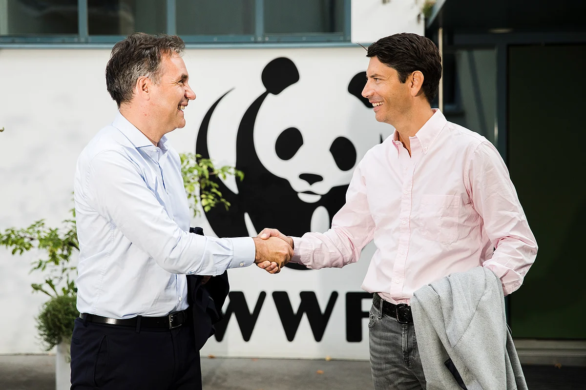 SIG CEO, Samuel Sigrist (right) met with WWF Switzerland CEO, Thomas Vellacott, to sign a major new partnership to help protect, sustainably manage and restore forests globally.