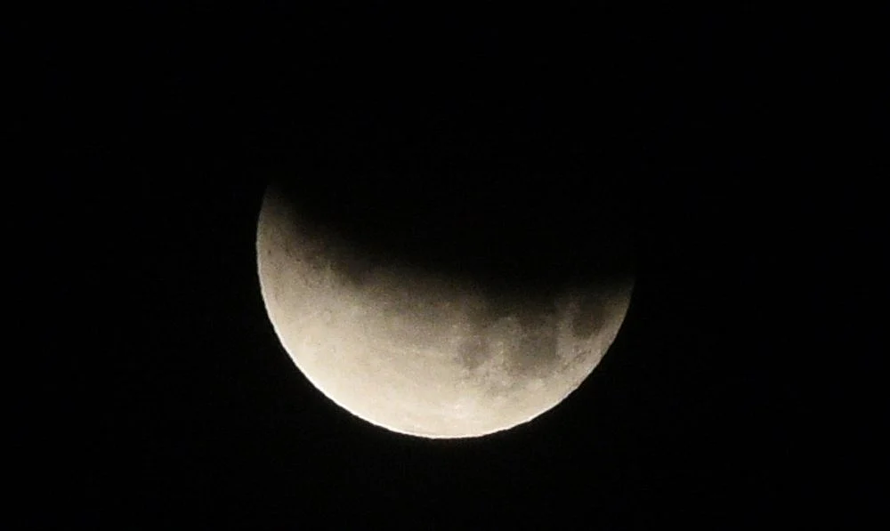 Partial Lunar Eclipse, as seen in the skies of Surat on Tuesday