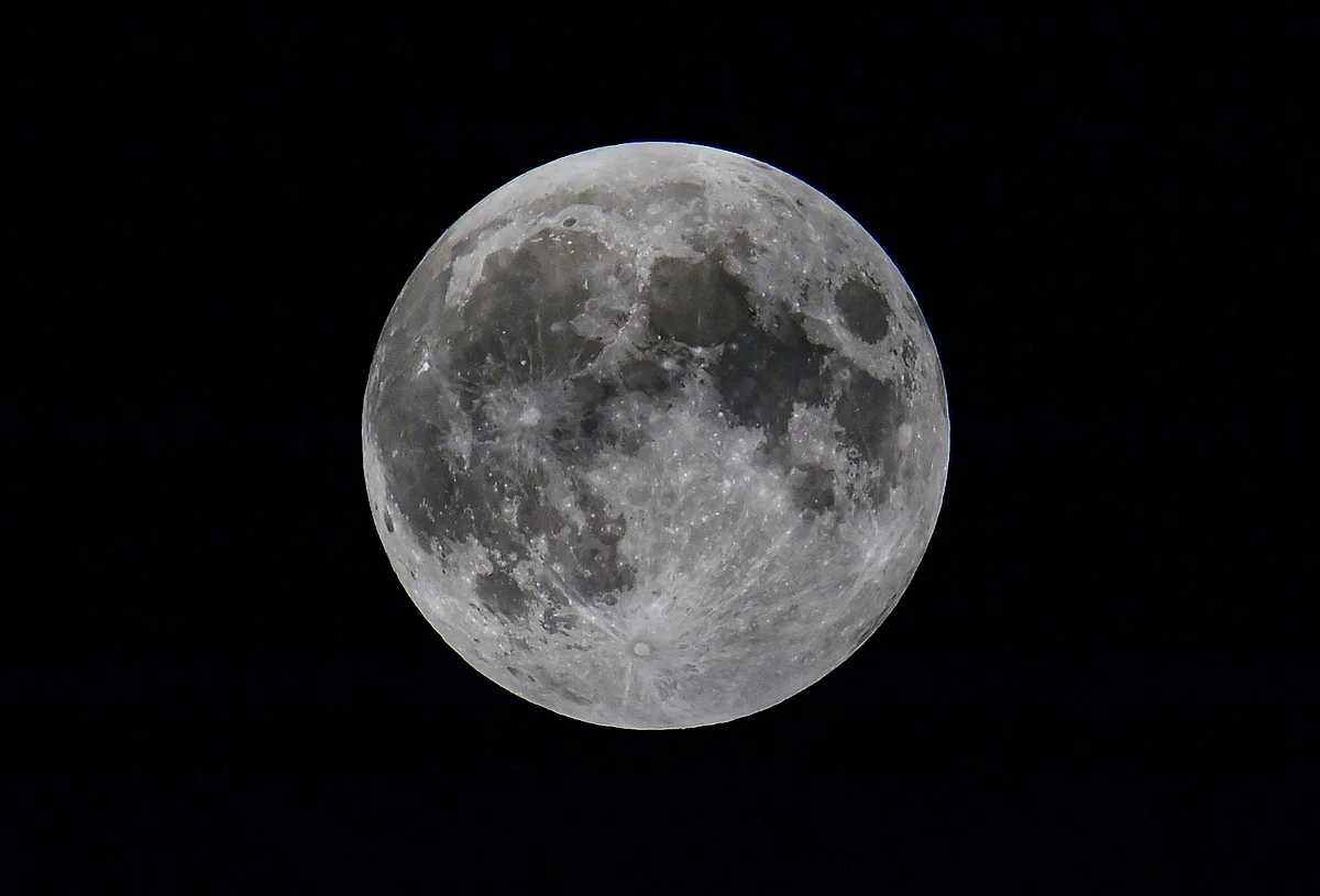 A view of the moon during a partial lunar eclipse, as seen from New Delhi, early Wednesday, July 17, 2019