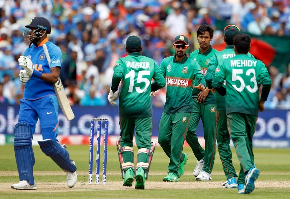 Bangladesh squad celebrate the dismissal of Hardik Pandya during a match against India in ICC CWC 2019 at Edgbaston in Birmingham on Tuesday