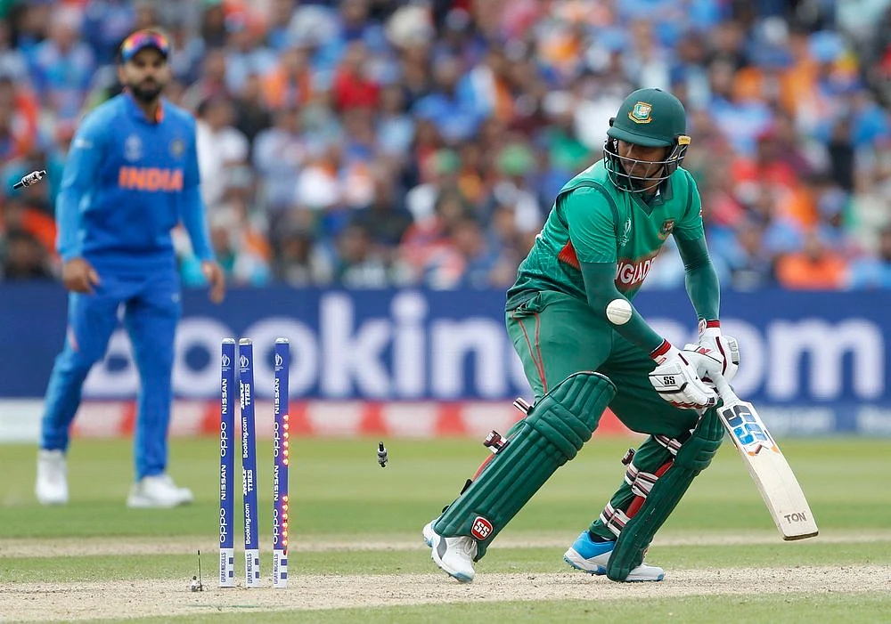 Bangladesh's Mosaddek Hossain gets bowled during a match against India in ICC CWC 2019 at Edgbaston in Birmingham on Tuesday