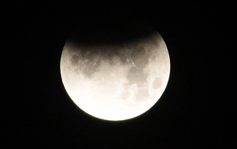 Partial Lunar Eclipse, as seen in the skies of Surat on Tuesday