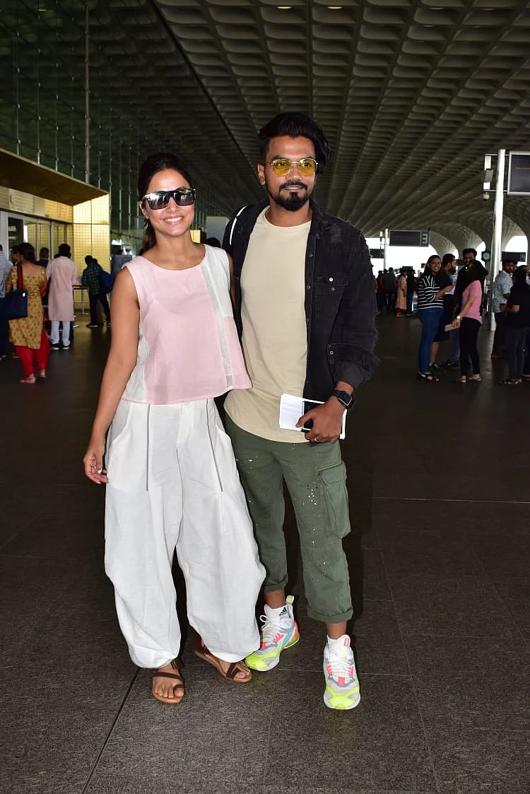 TV actress Hina Khan on Monday morning jetted off to London with boyfriend Rocky. The two were all smiles for the shutterbugs as they headed out. Both seen in a casual look, seemed like they were leaving for a week off to relax.