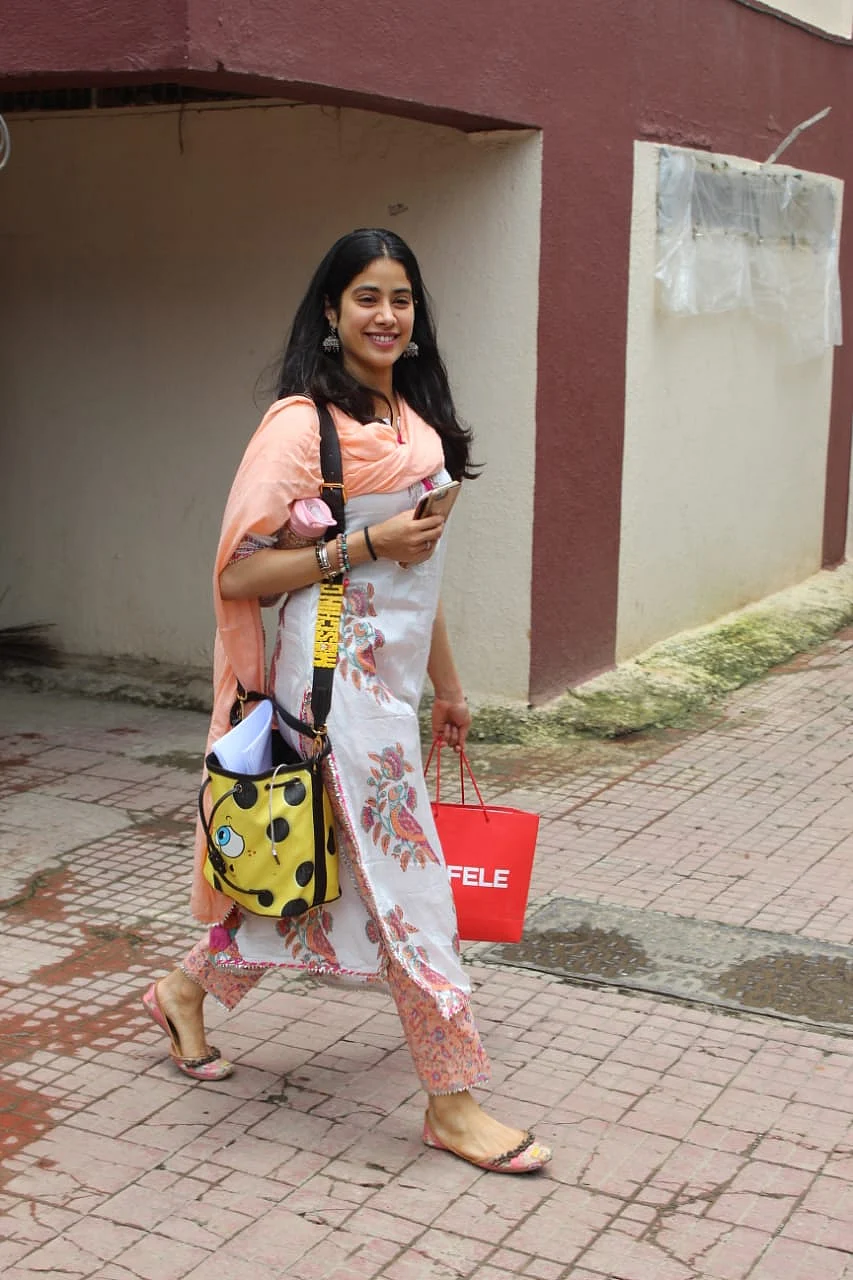 Janhvi Kapoor returned home this morning and is already heading out for work commitments. After a while she was seen in a floral print three piece dress today.