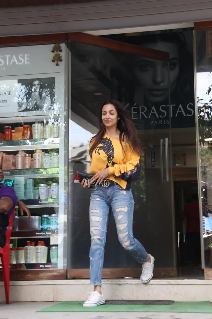 Malaika Arora snapped as she was stepping out of salon in Mumbai.