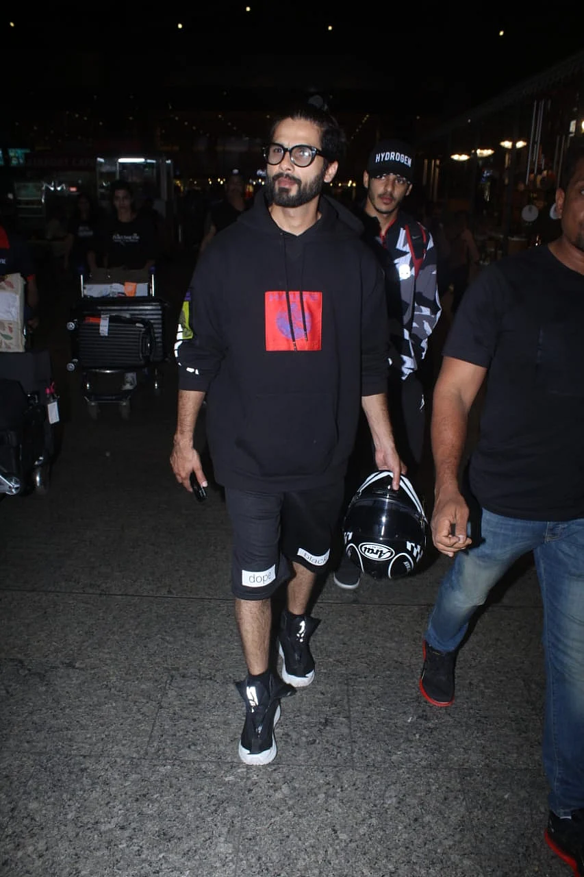 Shahid was snapped at Mumbai airport with Ishaan both holding on to their helmets as they headed for their cars.