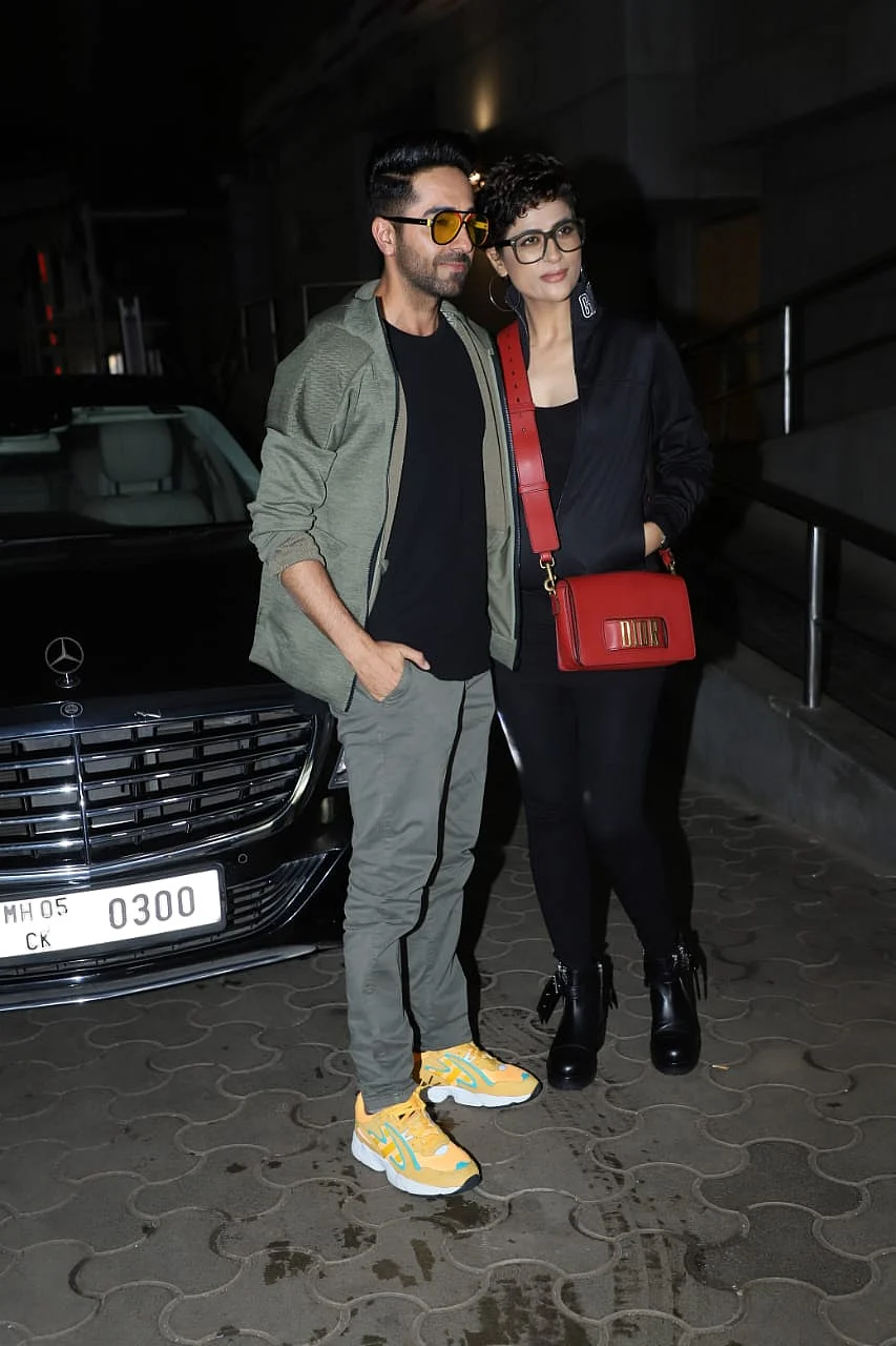Ayushamann Khurrana was seen wearing green jacket with matching pants and a black t-shirt twinning with his wife