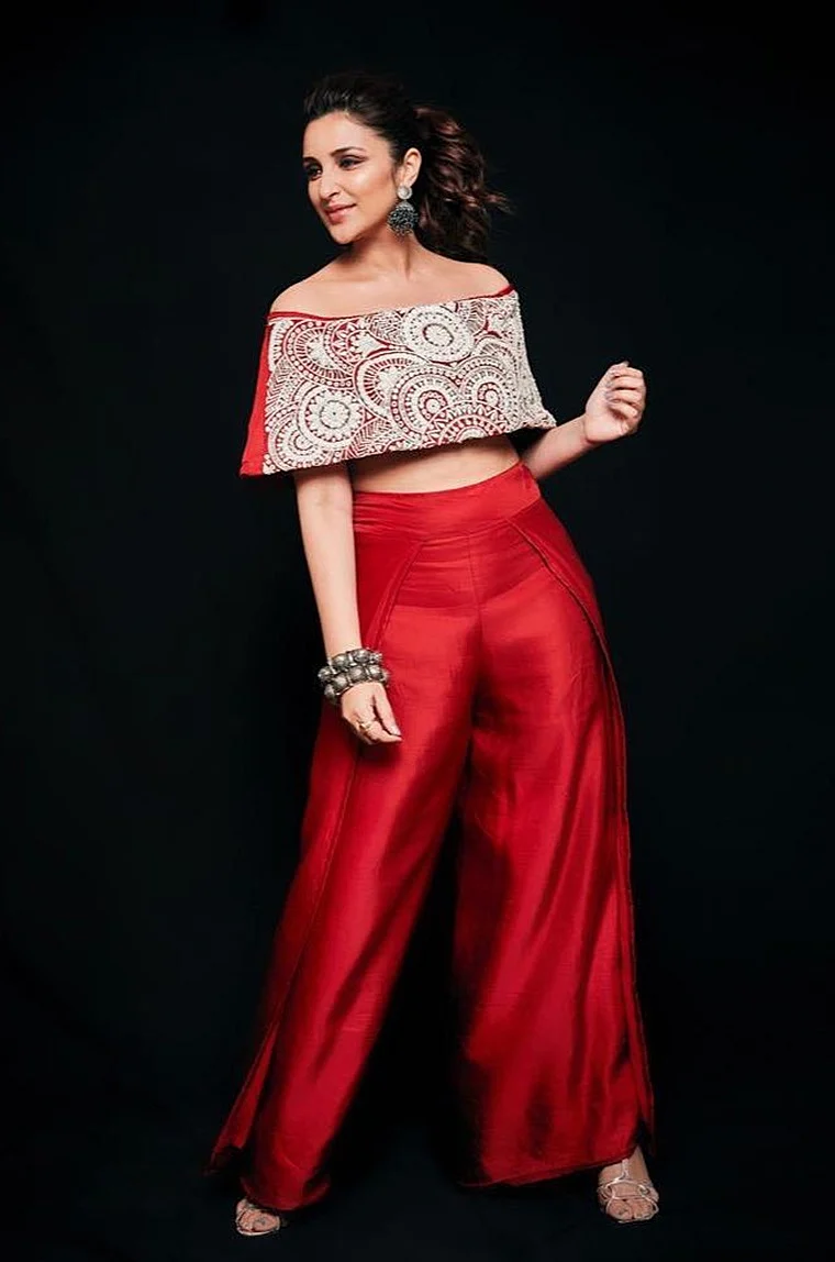 Parineeti Chopra's look is for the modern day girl who loves to ditch her lehenga for some well fitted pants. This indo-western avatar with an off shoulder blouse is perfectly trendy for this year.