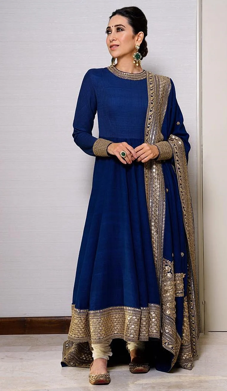 Karisma Kapoor teaches you how to wear this much loved colour. The royal blue colour is a star element in itself, and is best kept untouched with minimal accessories and embellishments.