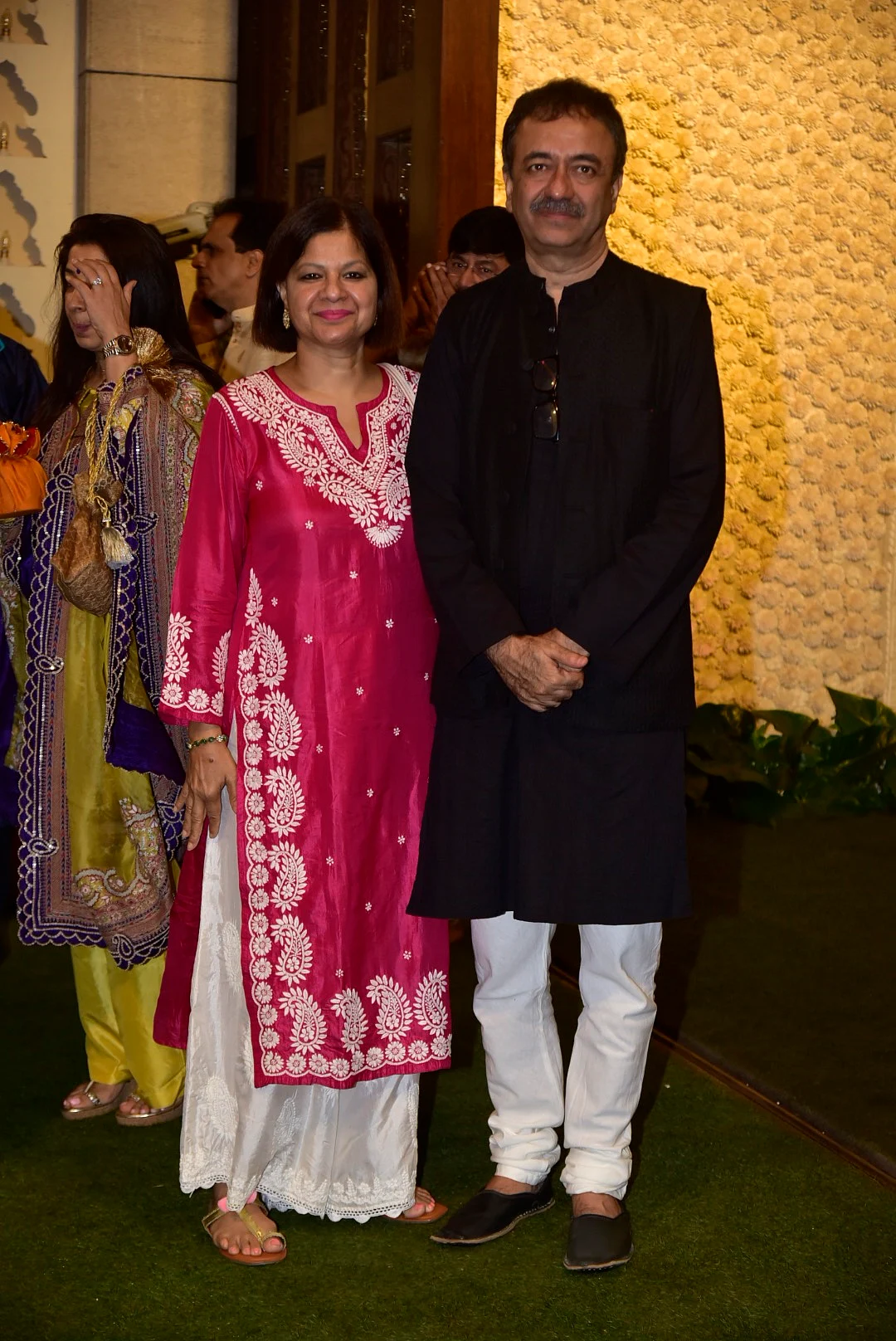 Director Rajkumar Hirani with wife at the Ganesh Puja at Ambani's in Mumbai