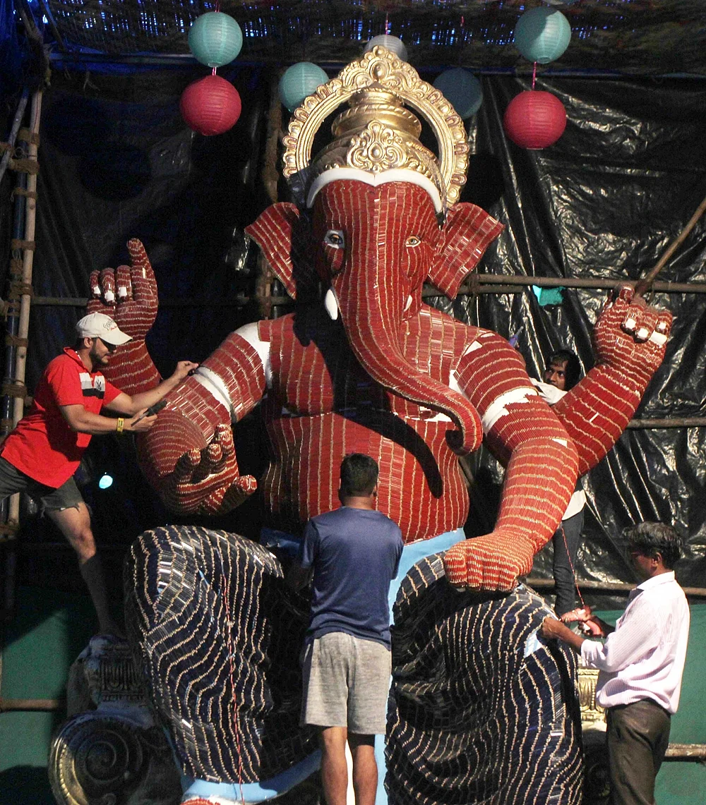 Coconuts, Fish Food, Pencils: Check out these innovative Ganesh Idols