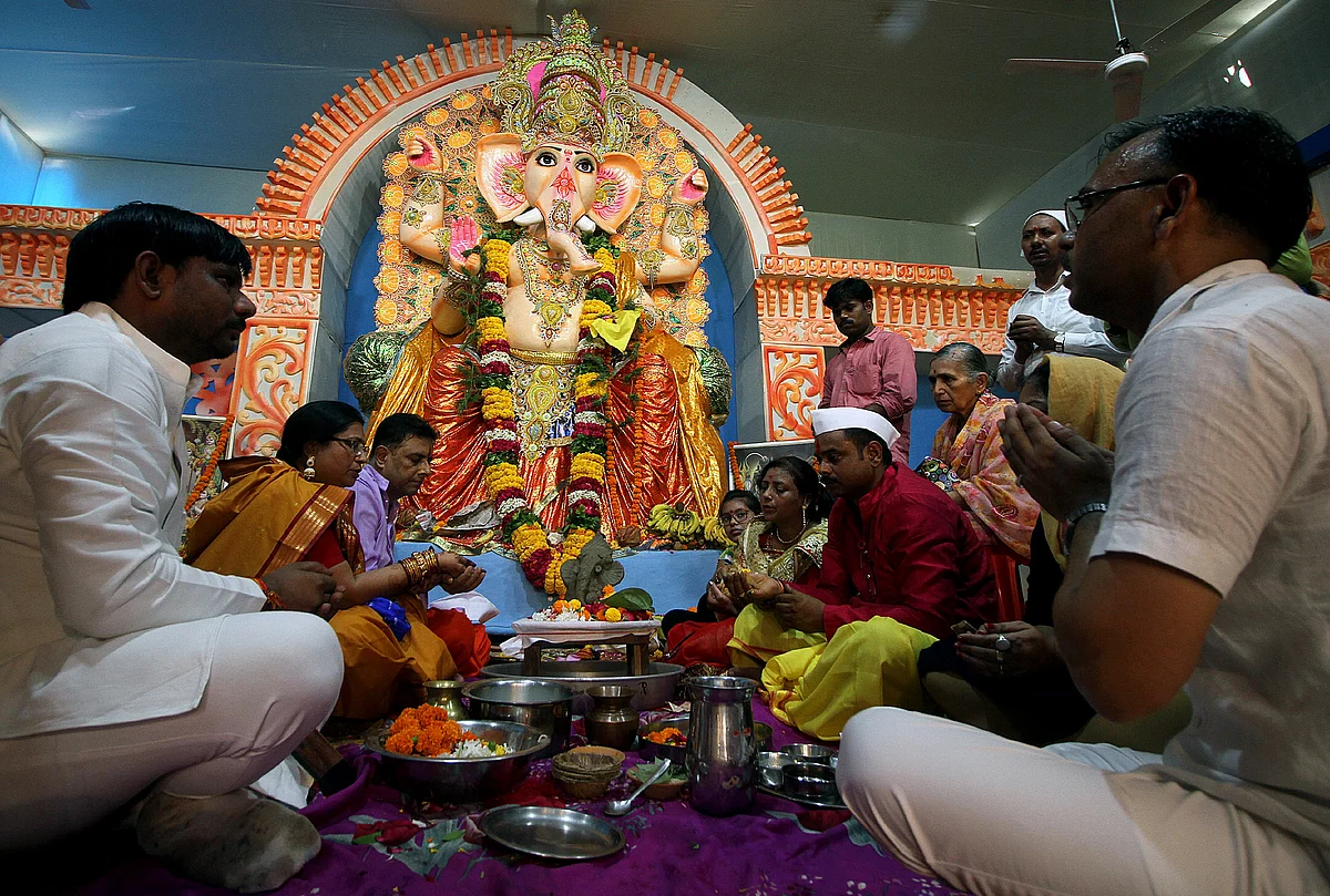 Devotees offering prayers after the installation of an idol of Lord Ganesh at Patrakarpuram Ganesh Puja Pandaal on the occasion of Ganesh Chaturthi in Lucknow