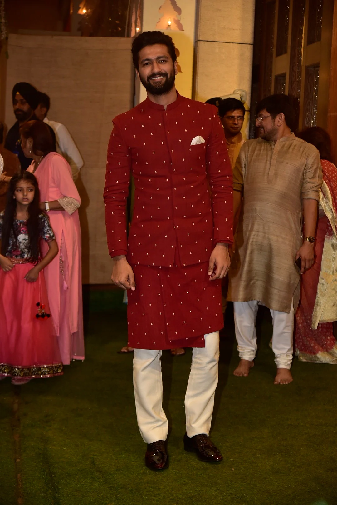 Vicky Kaushal wore a traditional red Kurta to pay his respect at the Ambanis'