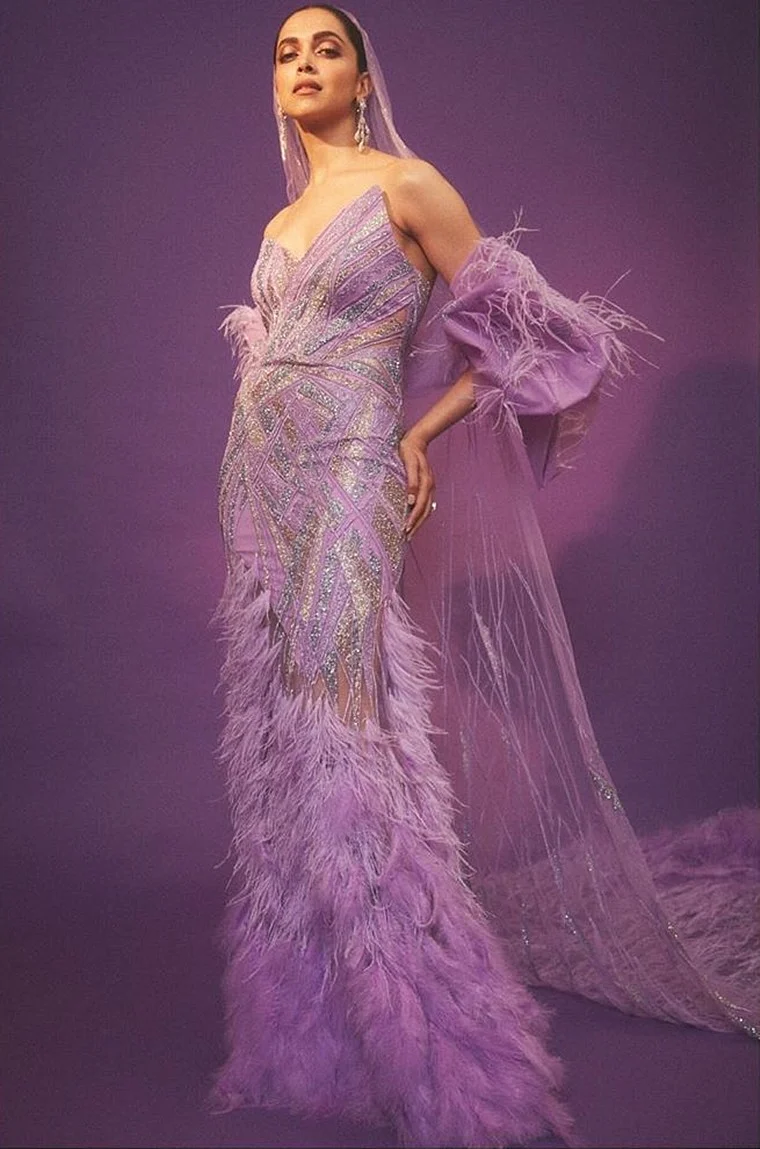 While Deepika Padukone's purple outfit is absolutely extra, the style can of wearing a chunri or veil on the head will never go out of fashion.