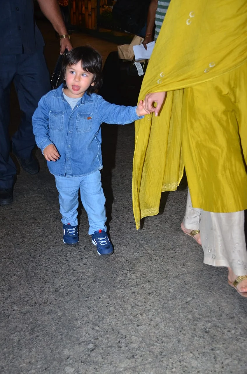 Video: Taimur teases paparazzi by sticking his tongue out at the airport