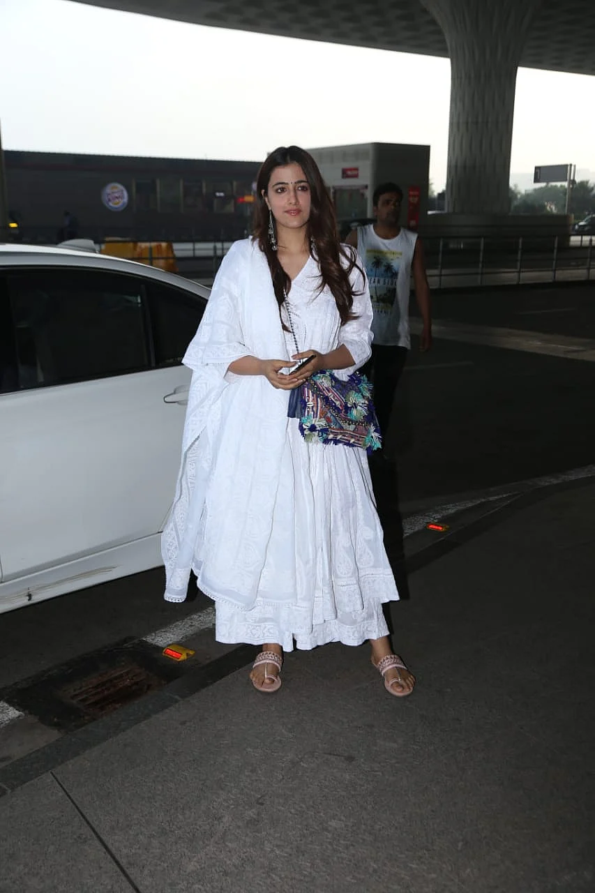 Nupur Sanon makes her airport fashion debut in a pristine white anarkali suit