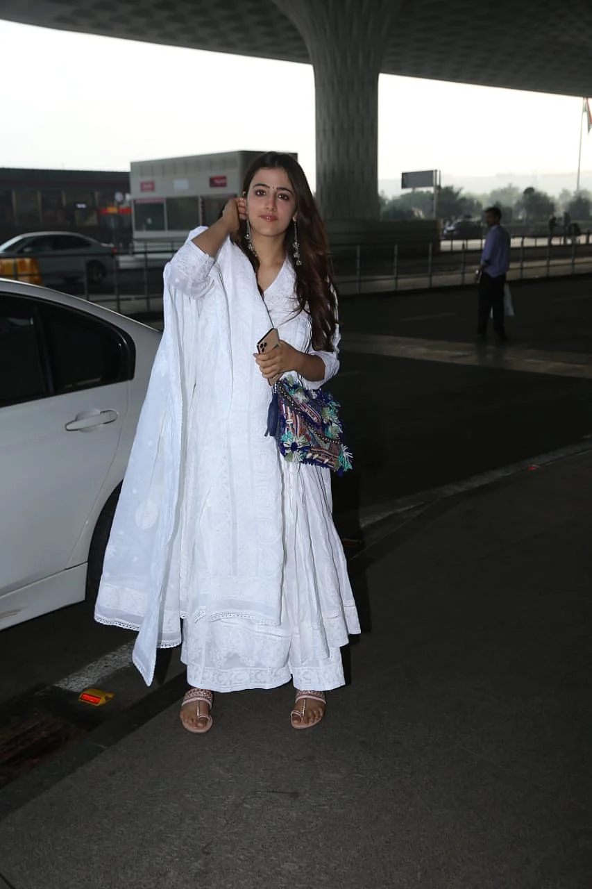 Nupur Sanon makes her airport fashion debut in a pristine white anarkali suit