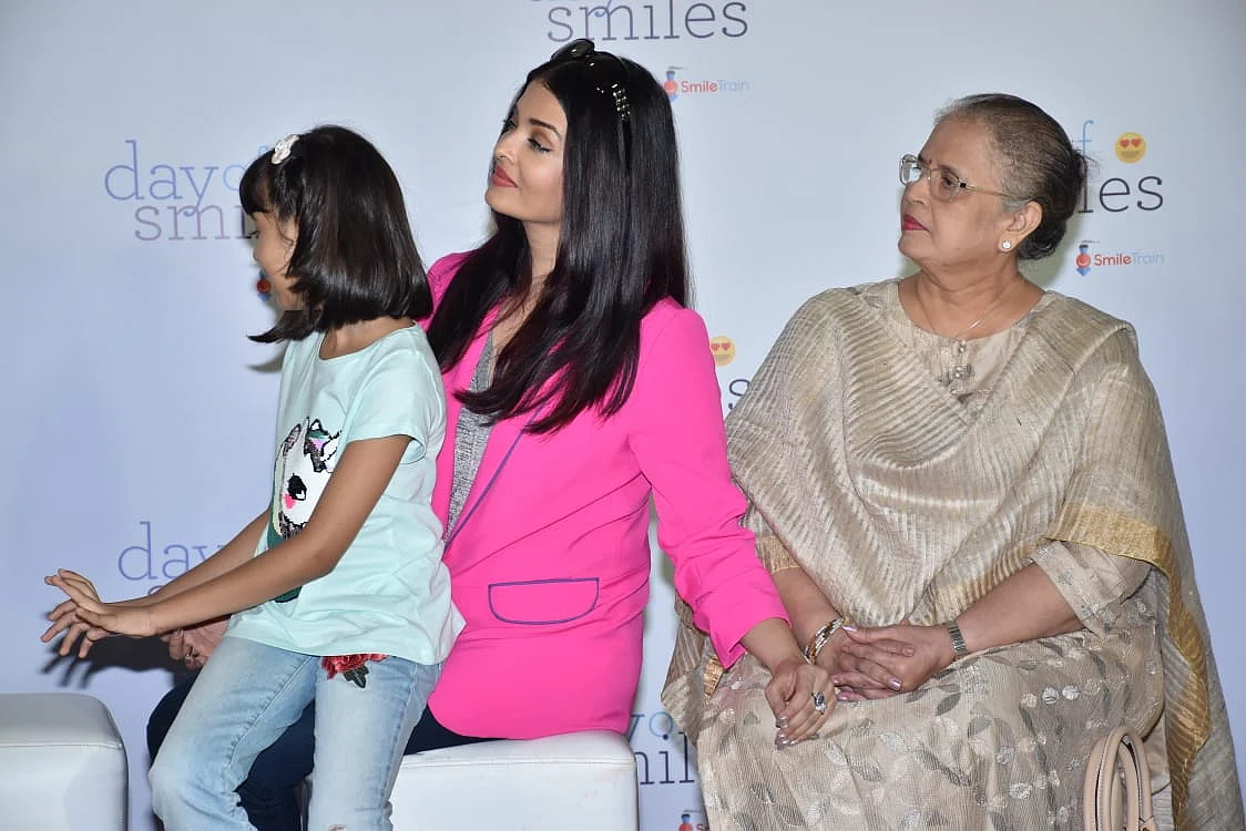Mama's Girl! Aaradhya snuggling up to mom Aishwarya during an event is all things adorable