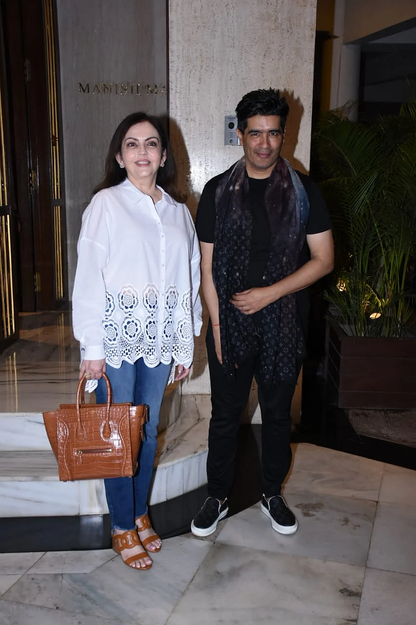Nita Ambani keeps it simple yet stylish in a chic white shirt and blue jeans