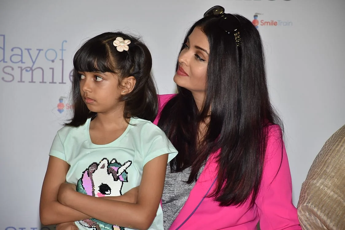 Mama's Girl! Aaradhya snuggling up to mom Aishwarya during an event is all things adorable