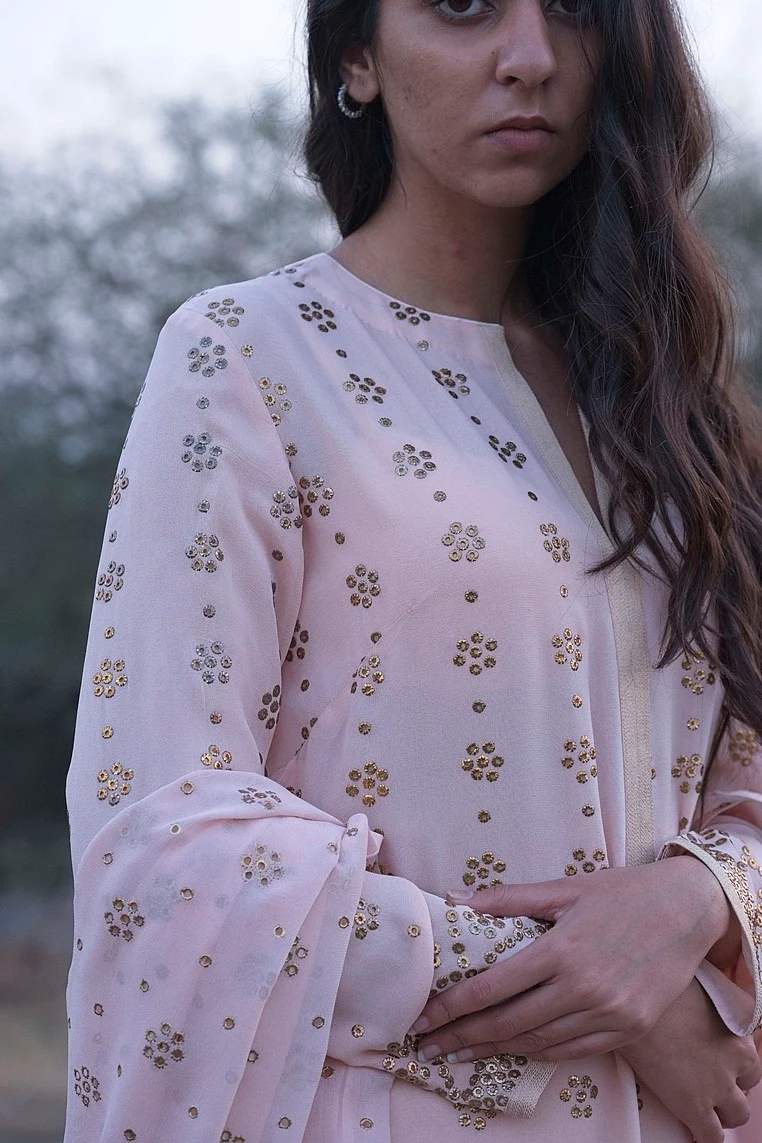 Luxury at needlepoint: From machine-made clothes, designers have now turned to traditional embroideries with a contemporary twist