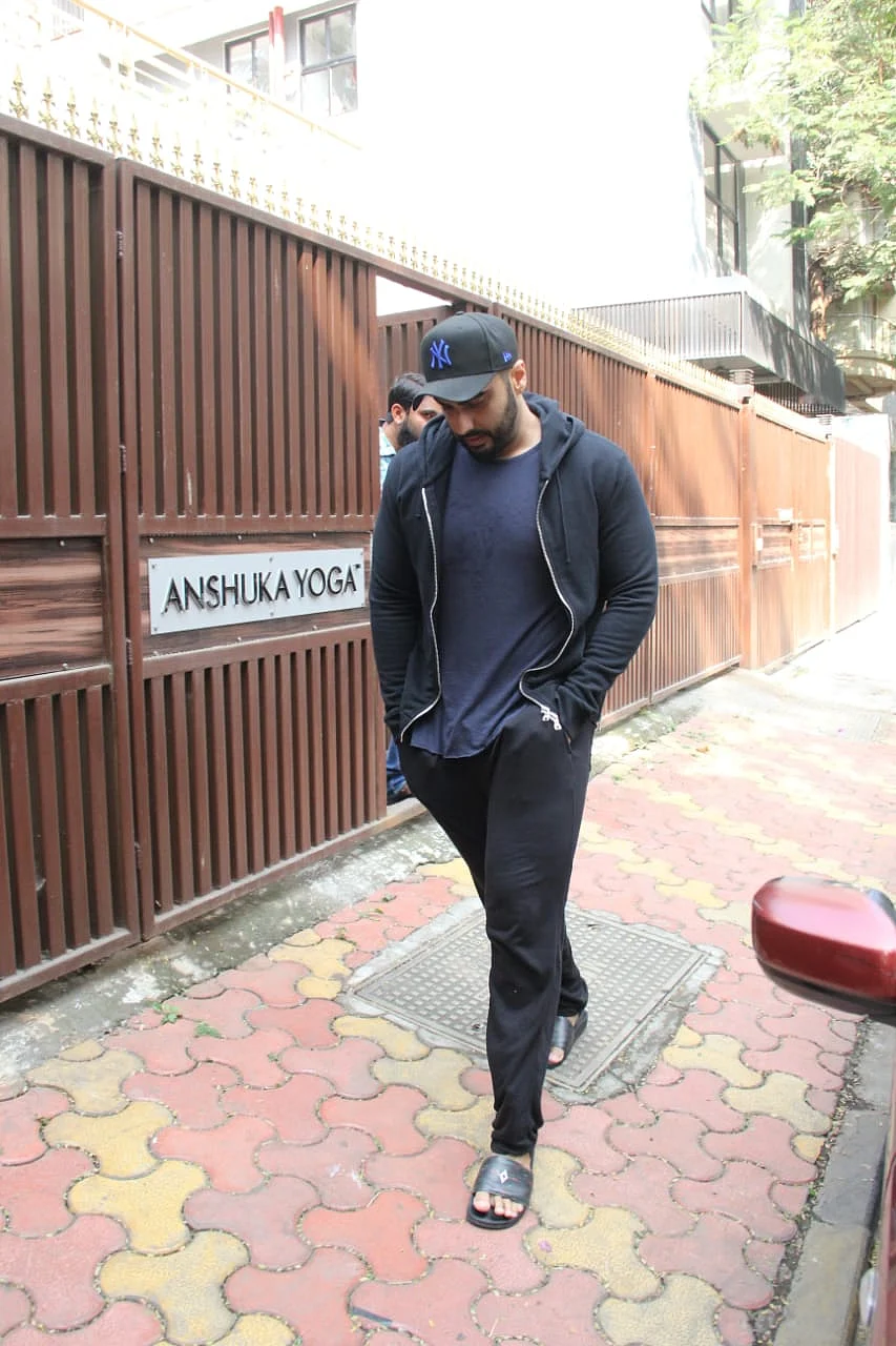 Why does Arjun Kapoor go to a different yoga studio instead of the one owned by girlfriend Malaika Arora?