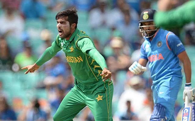 Mohammad Amir (L) Rohit Sharma (R)