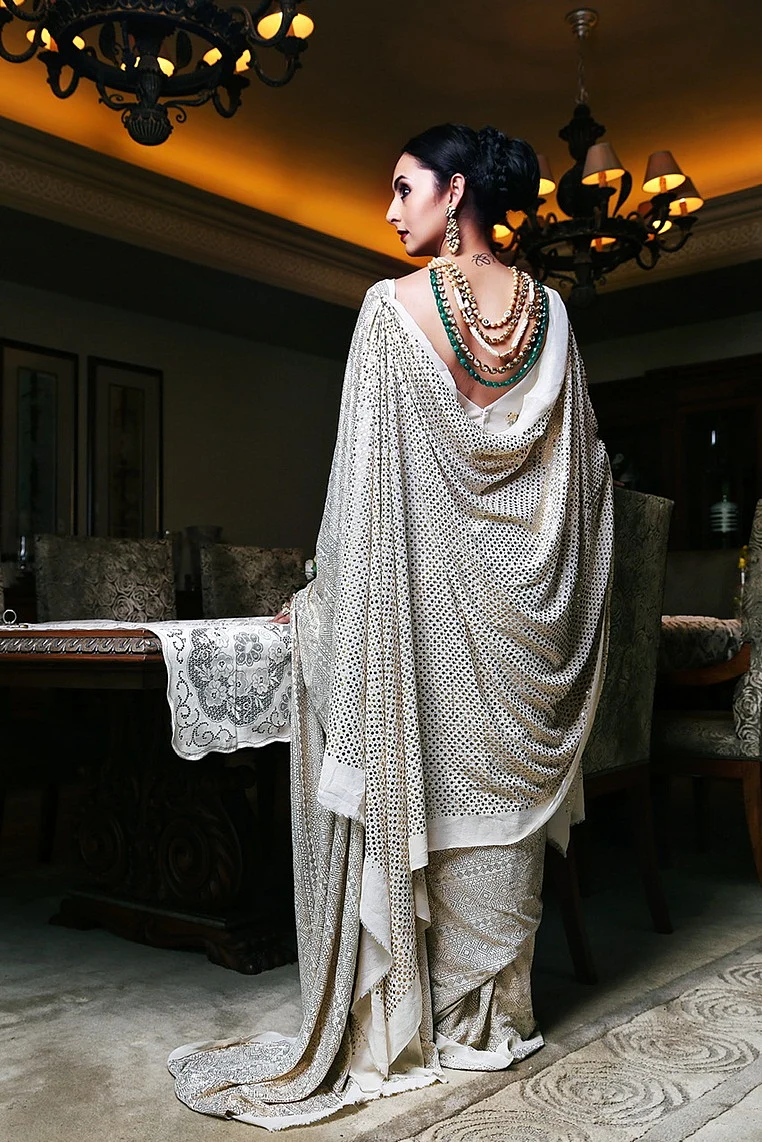 Luxury at needlepoint: From machine-made clothes, designers have now turned to traditional embroideries with a contemporary twist