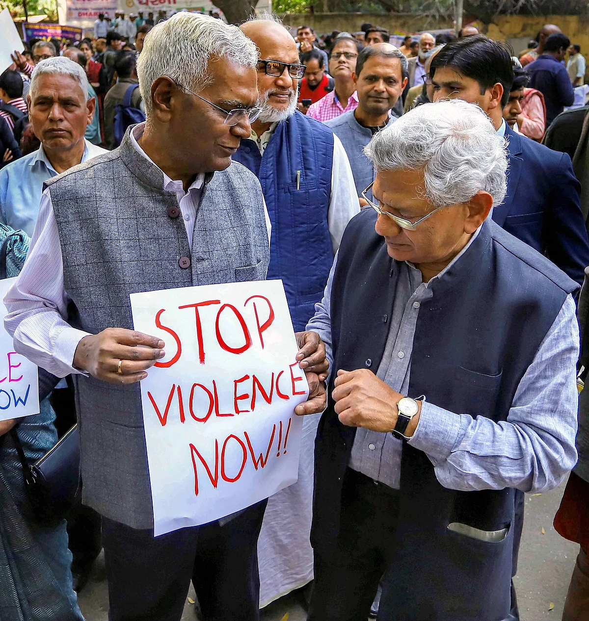 General Secretary of Communist Party of India (CPI) D Raja and CPI(M) general secretary Sitaram Yechury stage a peaceful protest in view of the recent violence in riot-affected areas of east delhi, in New Delhi, Wednesday, Feb. 26, 2020.