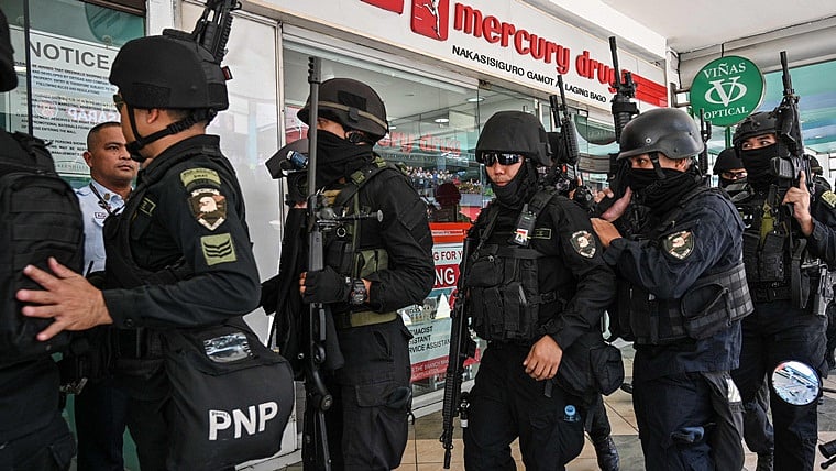 Irked by dismissal, security guard takes around 30 people hostage at