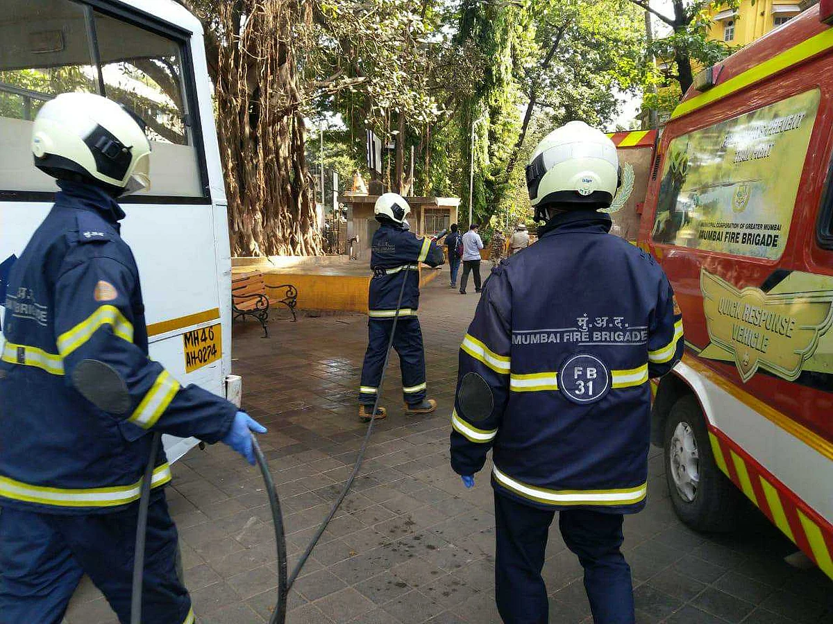 Mumbai Fire Brigade staffer with the help BMC Solid Waste Management at KEM Hospital premises