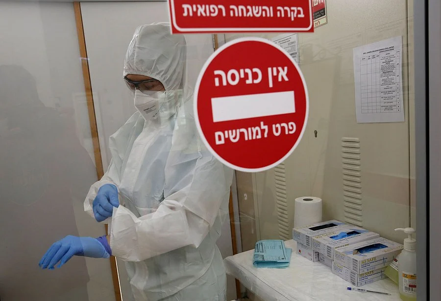 A medical worker works at the department of the coronavirus of the Assaf Harofeh Medical Center in the central Israeli city of Tel Aviv on June 18, 2020.