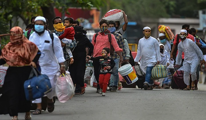 Migrants from Bihar arrive to board a Shramik train at Chennai Central Railway Station