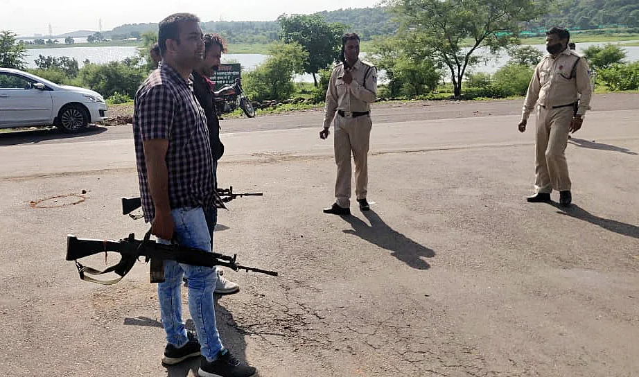 Police personnel at the spot after the encounter happened between police and miscreant, near Kalia Sot Sanskar Valley School Road in Bhopal on Wednesday.