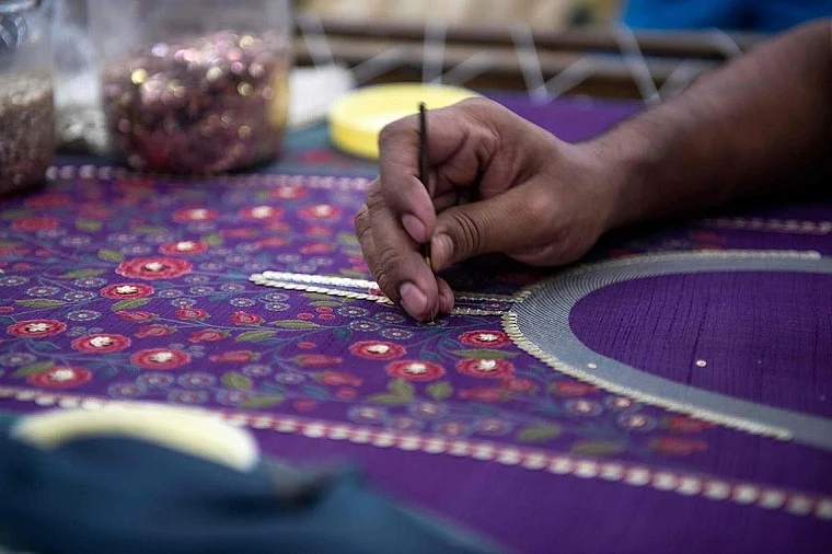 Karigars working in the fashion industry are perhaps struggling to have their basics in place