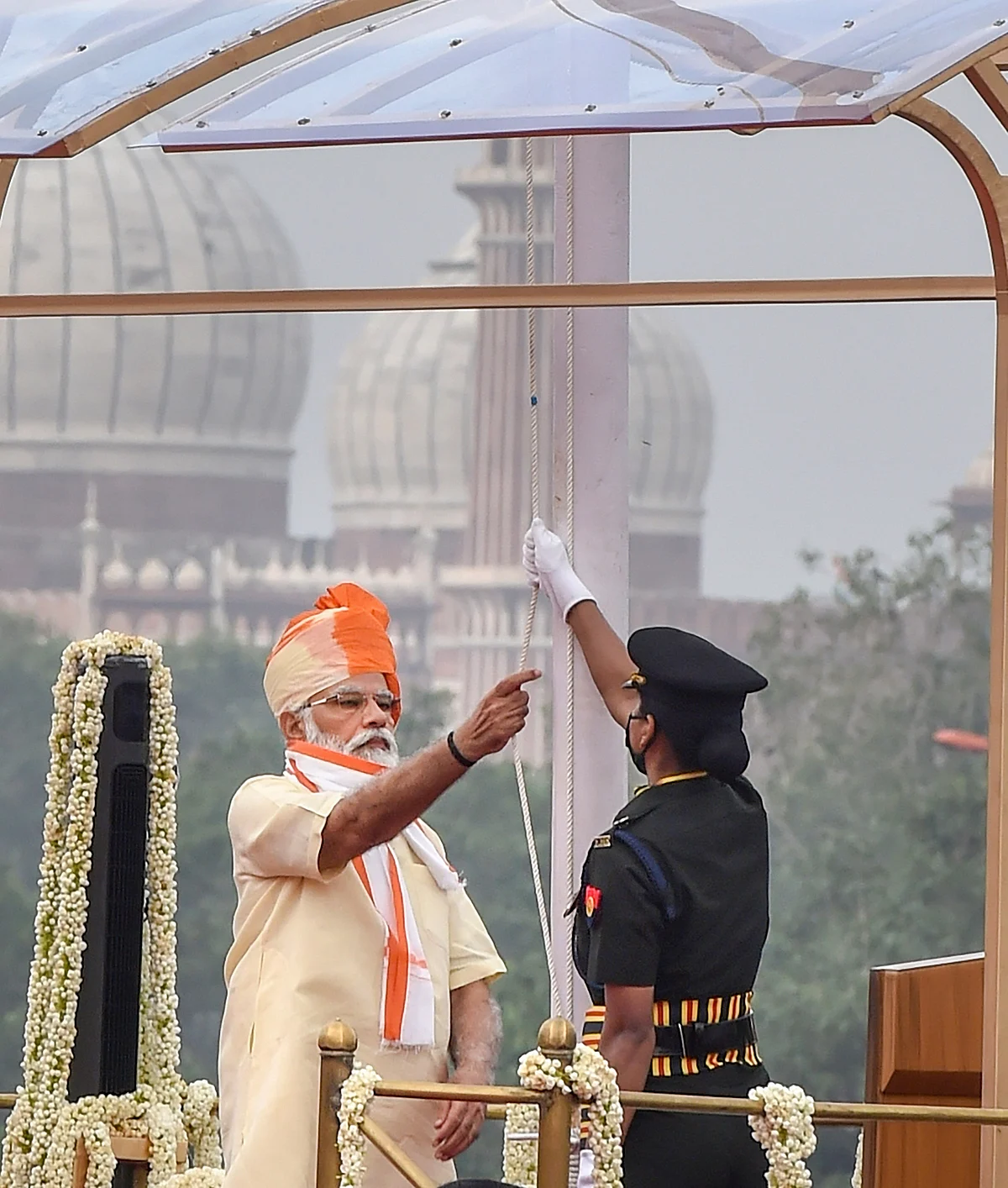 Prime Minister Narendra Modi unfurls the national flag during the 74th Independence Day celebrations, at Red Fort in New Delhi, Saturday, Aug. 15, 2020.