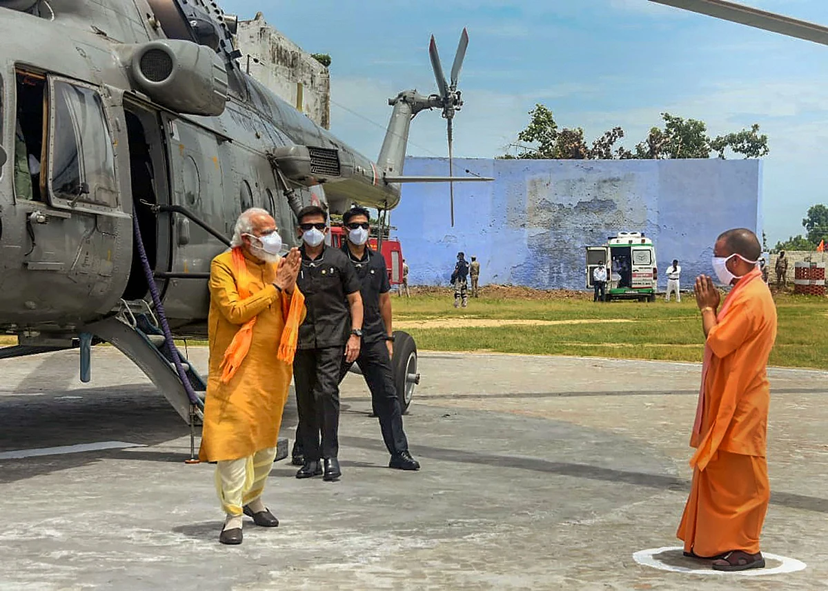 Prime Minister Narendra Modi being welcomed by Uttar Pradesh Chief Minister Yogi Adityanath ahead of the inception of Bhoomi Pujan for the construction of Ram Temple, in Ayodhya