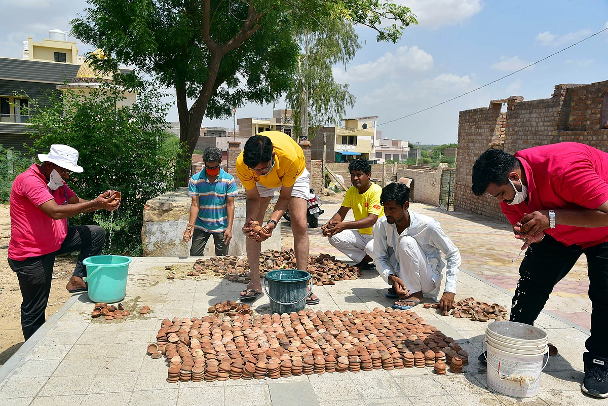 Devotees preparing of 5100 diya ahead of foundation laying ceremony of Ram Mandir in Ayodhya