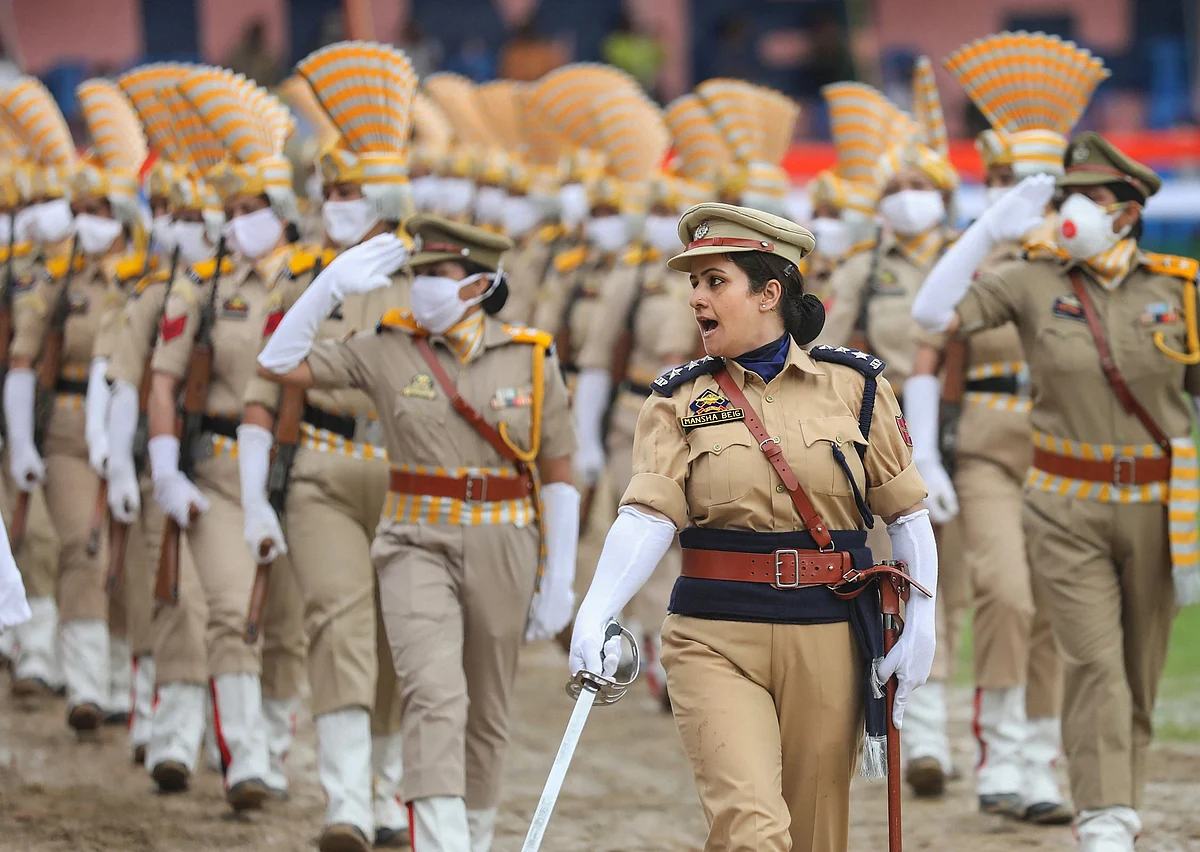 J&K Women Police contingent march- past during the full-dress rehearsal ahead of the 74th Independence Day parade, at Mini Stadium in Jammu, Thursday.