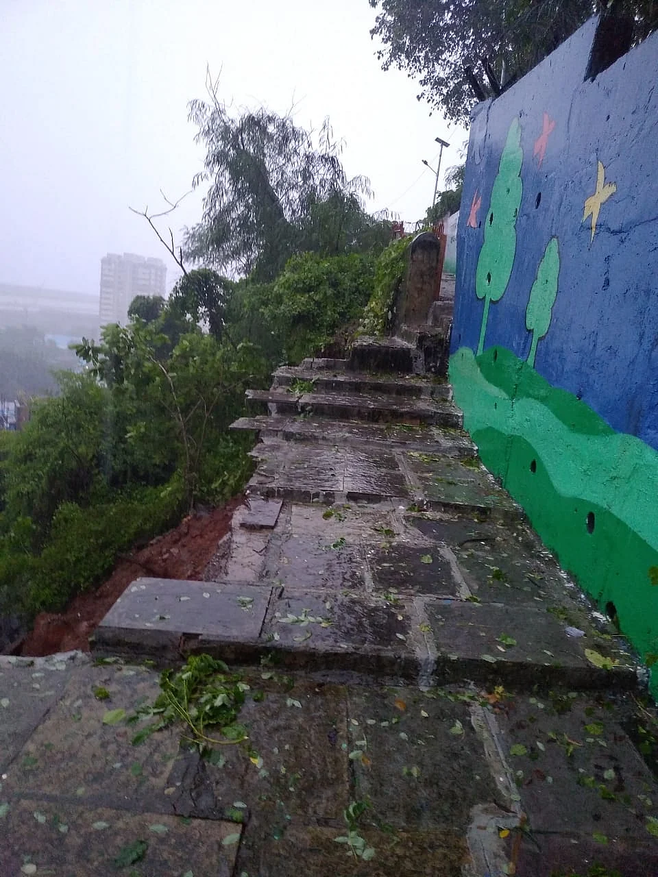 Road leading to the 350-year-old Mazegaon temple caved in