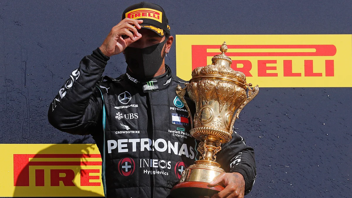 Despite puncture on last lap, Lewis Hamilton wins British ...