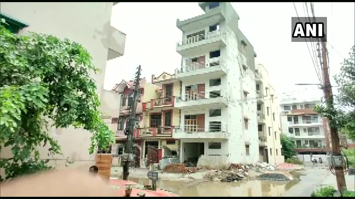 Police vacated a four-storey building in Gurugram's Sector-46 after it bent on one side, following heavy downpour in the region.
