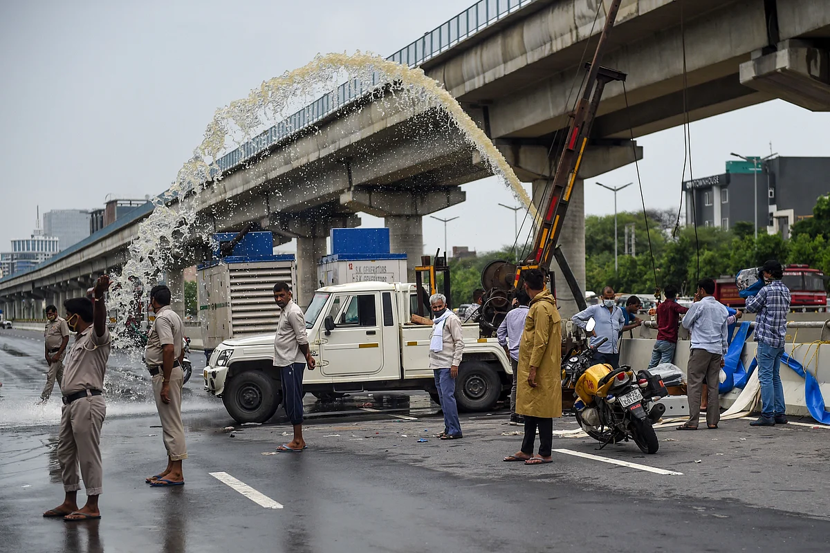 Water is pumped out from a flooded road underpass following monsoon rainfall in Gurgaon on August 20, 2020.