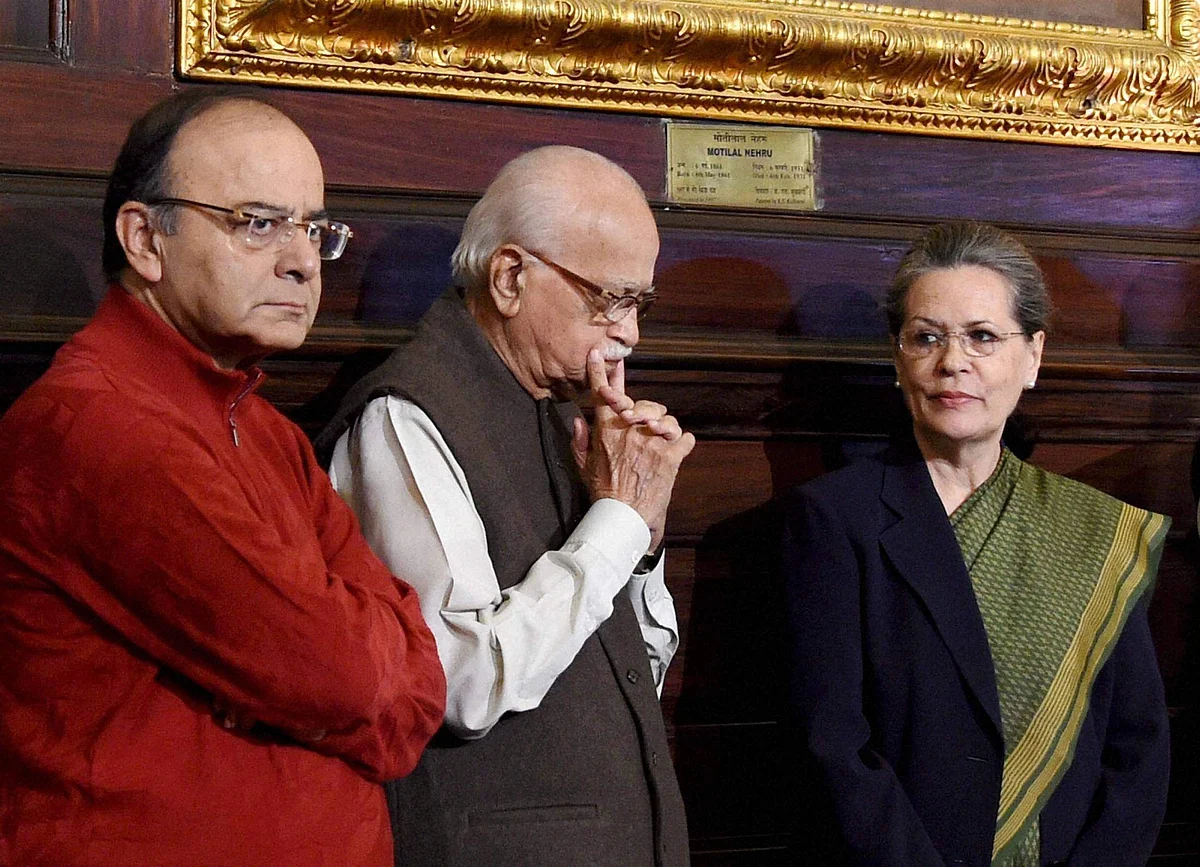 Union Minister Arun Jaitley with BJP senior leader LK Advani and AICC President Sonia Gandhi at an event to pay tribute to former PM Indira Gandhi on her birth anniversary at Parliament House in New Delhi on 19/11/2016.