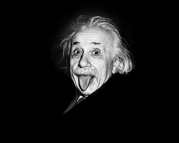 Albert Einstein sticks out his tongue for a photograph on this 72nd birthday.