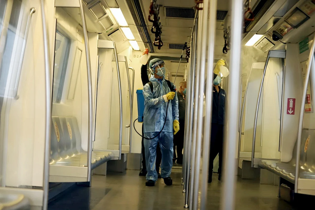Preparation underway at the metro station as Delhi Metro rail gears up to resume services from Monday as part of Unlock 4, in New Delhi on Sunday.
