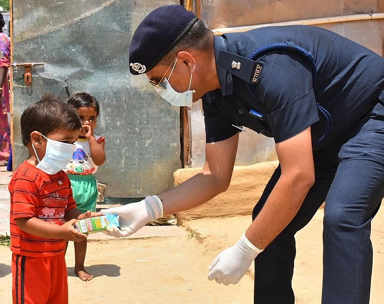 Distribution of food as part of Mission Feed India