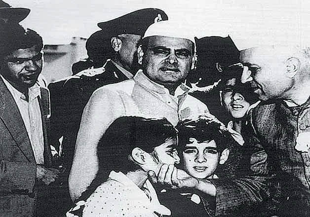 Feroze Gandhi with his son Sanjay Gandhi and Rajiv Gandhi Sharing Light Moments with Pandit Nehru.