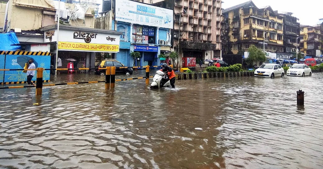 In Pics: Roads waterlogged, vehicles damaged - How Mumbai looked as torrential rains lashed the city
