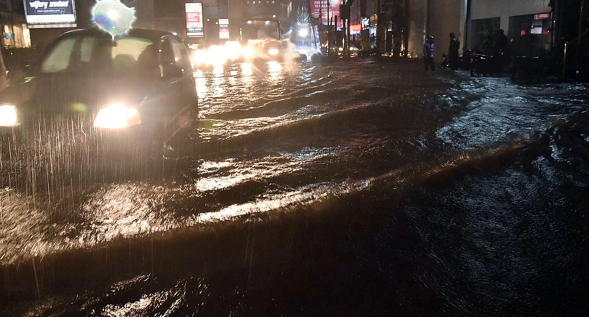 Watch: Man swept away, cars damaged as torrential rain batters Hyderabad